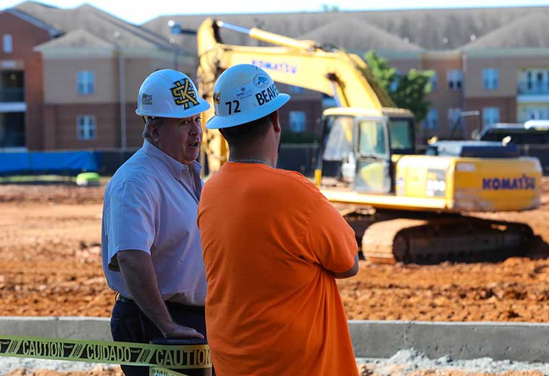 ksu student and faculty memeber on job site