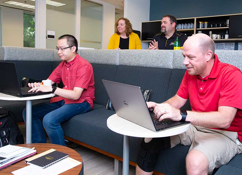 Data Science graduate students attending a upskilling workshops.