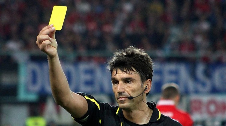 Soccer Ref with yellow card
