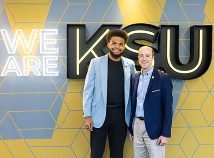 KSU MSIT alumni posing with faculty member