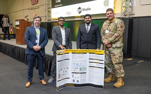 A picture of the first place winner for the PhD Research category, GPR-185 A Multimodal Approach to Quiz Generation: Leveraging RAG Models for Educational Assessments by Mourya Teja Kunuku