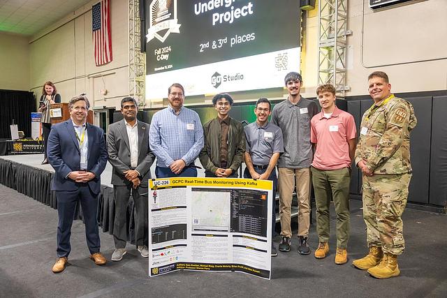 A picture of the second place winning project for Undergraduate Capstone, UC-226 Real-Time Bus Monitoring Using Kafka by Samuel A Bostian, Michael Rizig, Charlie McLarty, Brian A Pruitt, and Allen Roman
