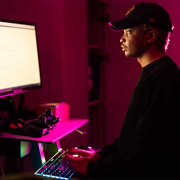 ksu computer science student working on desk top computer