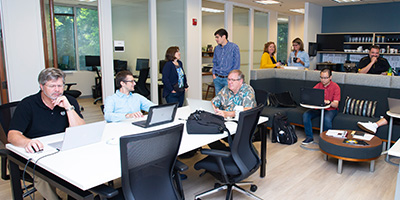 graduate data science students in study room