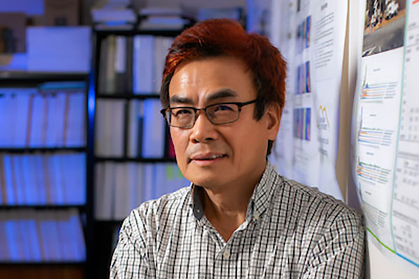 Chih Cheng Hung posing in the research lab.