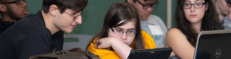 Students hard at work during the Hackathon event.