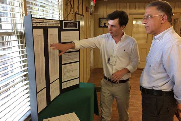 A student presenting his research.