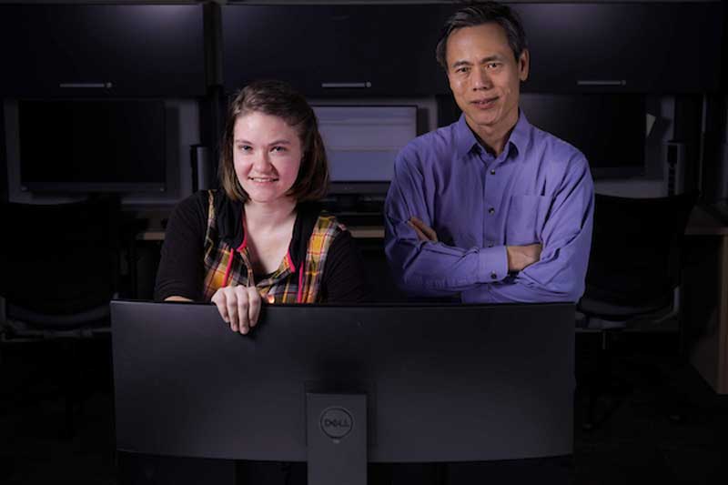 Ruth Bearden and Dr. Dan Lo posing in the computer lab. 