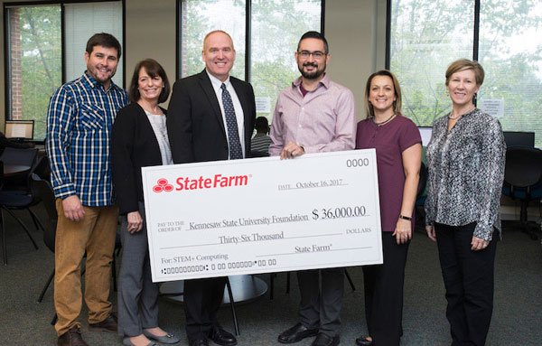 KSU CCSE faculty and staff posing together with the STEM grant. 