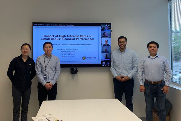 dr. sherry ni and phd students askhat yktybaev, mohammad naser and namazbai ishmakhametov posing together