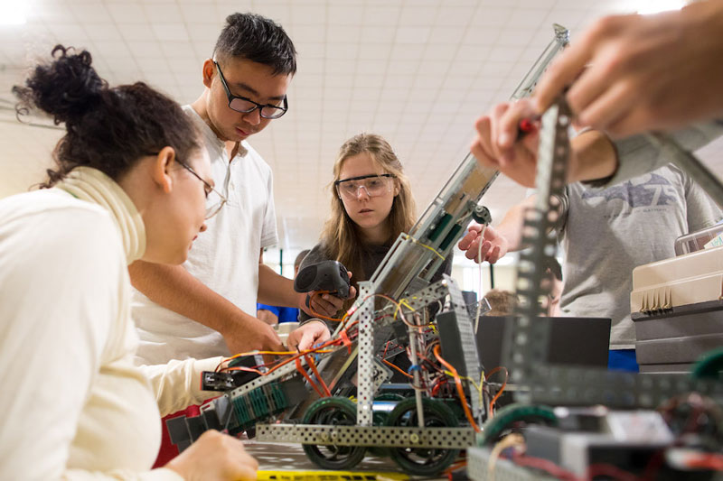 photo of ksu students in lab with professor