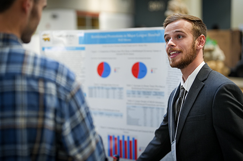 ksu student showcasing data analytics project