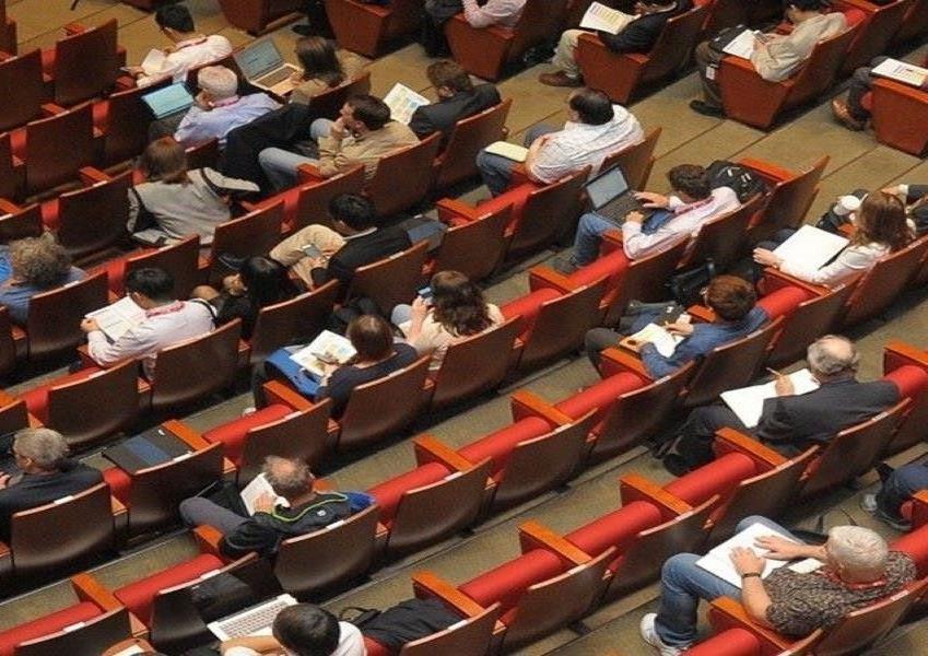 Audience seated in an auditorium