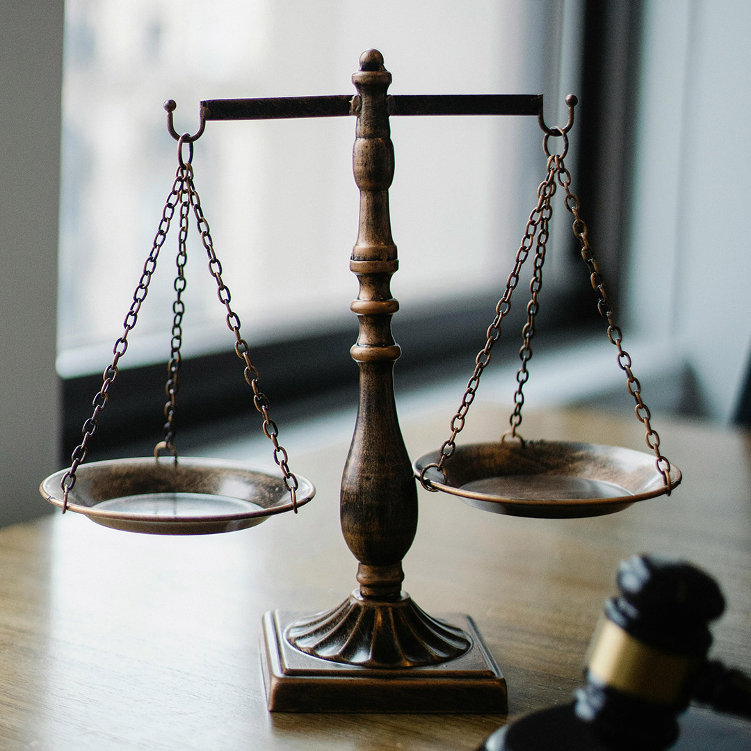 scales of justice on office table