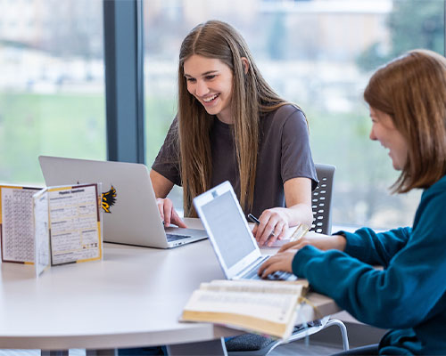 Two KSU Accountancy students studying for class.