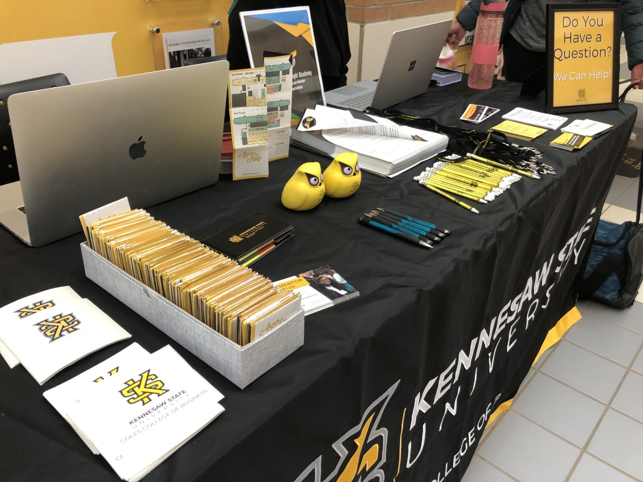 KSU Welcome Back table, full of school supplies.