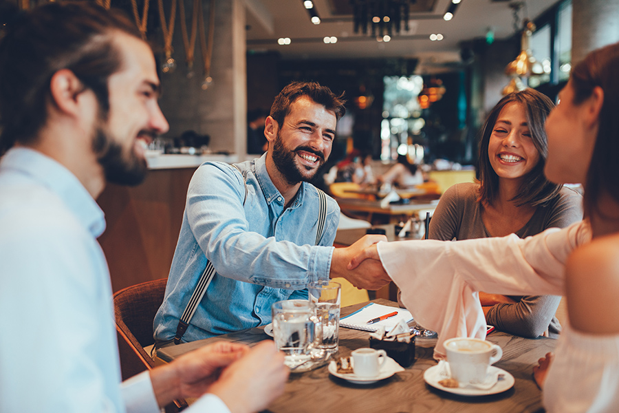 people having coffee together