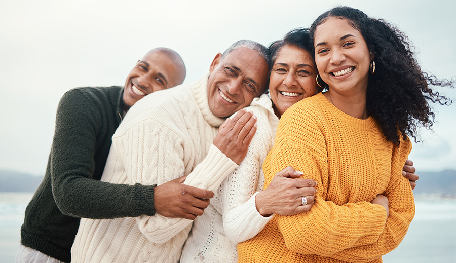 a group photo of a family of four