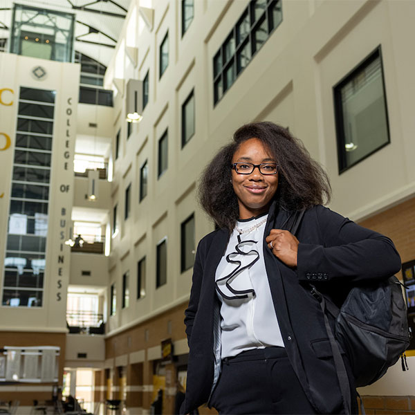 KSU Accountancy student in the Coles College building.