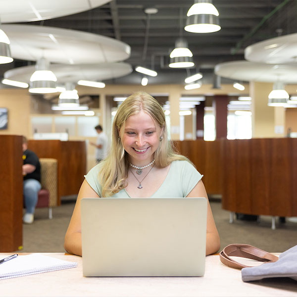 KSU Entrepreneurship student studying for class.