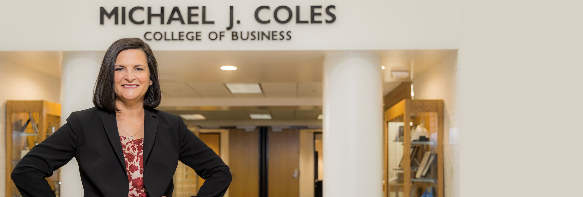 Dr. Robin Cheramie standing in front of coles school of business