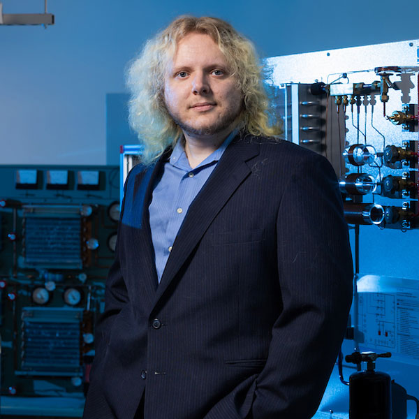 coles information systems student standing in lab 