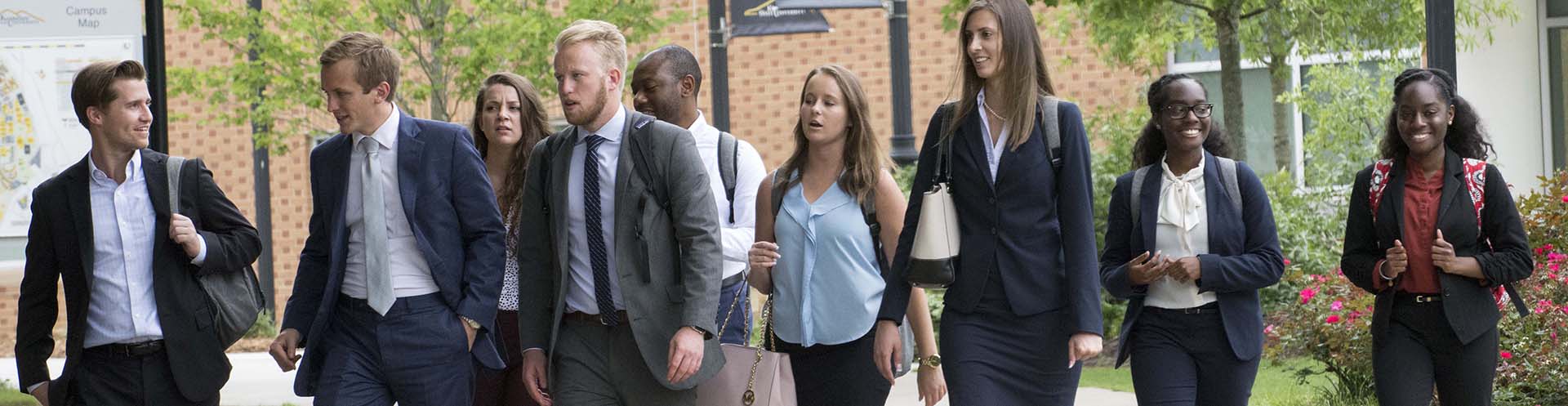 ksu hospitality management students outside walking toget