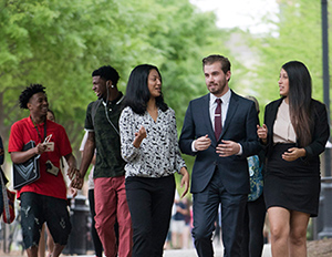 group of coles student outside having a conversation