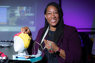 KSU Professor Adriane Randolph and Ph.D. Candidate Rosemary Tufon will present research on data security and brainwave tech in Austria