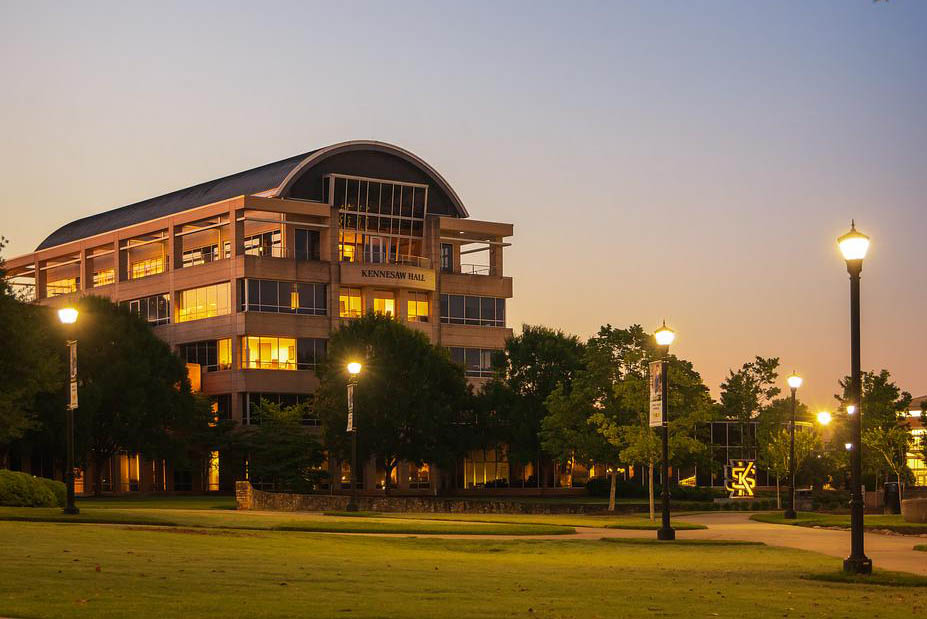 Kennesaw State University campus in the evening with streetlights on