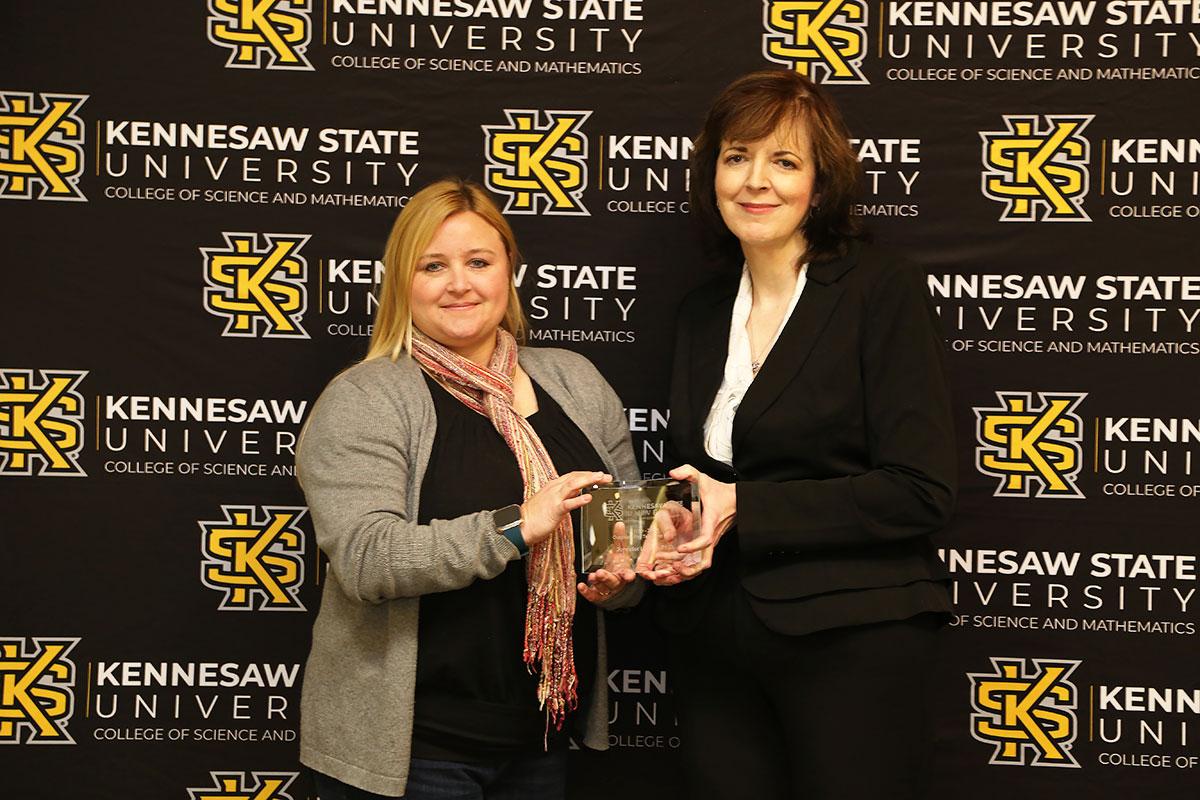  / Photo of the Outstanding Teaching Award winner, Dr. Jennifer Louten, Associate Professor of Biology, (left) and Dr. Marla Bell, Interim Dean (right)