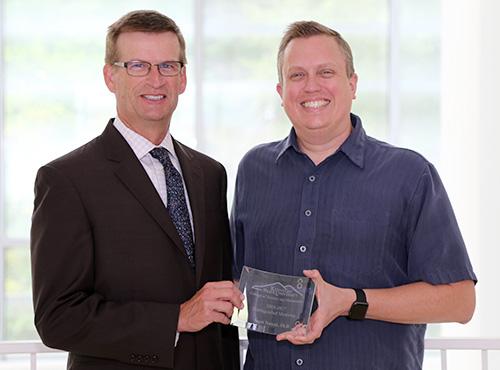  / Photo of 2016-2017 CSM Distinguished Service Award recipient, Virginia Watson, Ph.D., Associate Professor of Mathematics in the Department of Mathematics (left) and Dr. Mark Anderson (right).