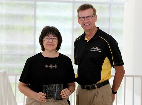  / Photo of 2016-2017 CSM Distinguished Service Award recipient, Virginia Watson, Ph.D., Associate Professor of Mathematics in the Department of Mathematics (left) and Dr. Mark Anderson (right).