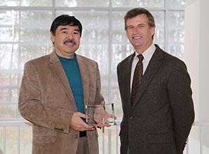  / Photo of 2015-2016 CSM Distinguished Professor Award recipient, Tad Watanabe, Ph.D., Assistant Chair of the Department of Mathematics and Professor of Mathematics Education (left) and Mark Anderson (right)