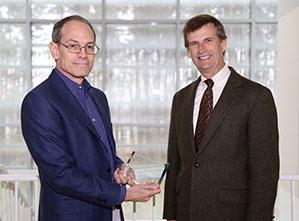  / Photo of 2015-2016 CSM Distinguished Mentoring Award recipient, John Haseltine, Ph.D., Associate Professor of Chemistry (left) and Mark Anderson (right)