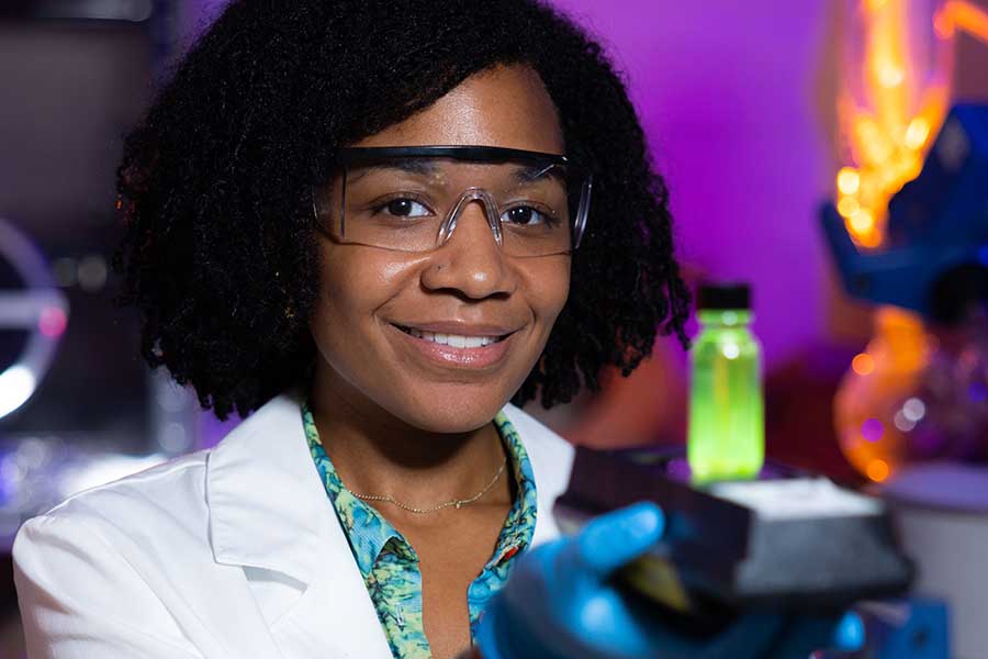 Student working on research in a chemistry lab / Chemistry major Kaia Ellis had been selected for a prestigious National Science Foundation (NSF) Research Experience for Undergraduates (REU) program at Northeastern University (NU) in Summer 2022.