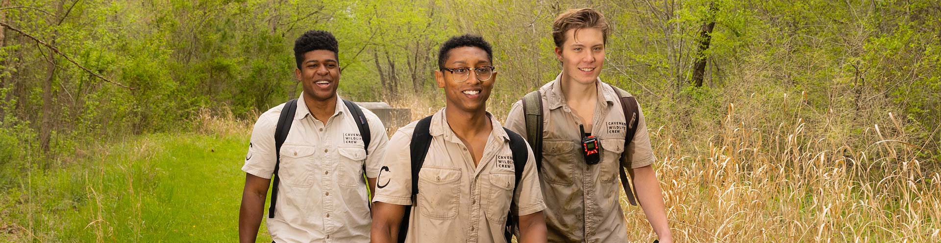 alt="A trio of Kennesaw State students spreads the gospel of ecology and conservation