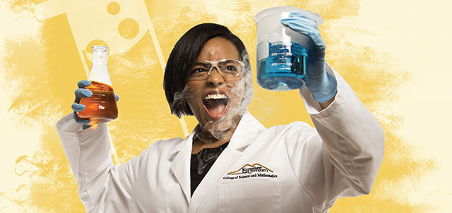 chemistry student holding lab equipment