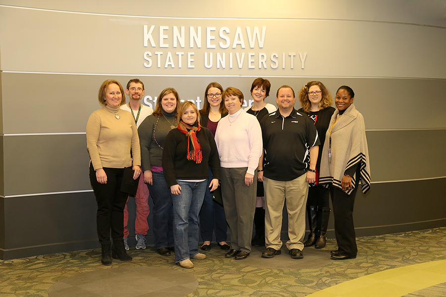Photo of CSM's FLC 2016 Cohort, pictured left to right: Ludmila Orlova-Shokry, Dr. Lake Ritter, Dr. Michelle Head, Dr. Jennifer Louten, Dr. Kimberly Cortes, Dr. Linda Galloway, Dr. Marla Bell, Ken Keating, Dr. Meredith Baker, and Dr. Kadian Callahan. Not pictured are Dr. Lori Klinger-Maffe, and Dr. Jennifer Vandenbussche.