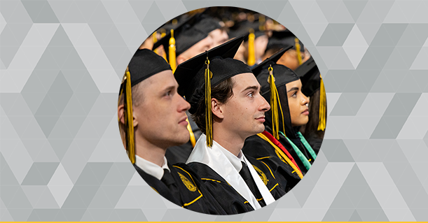Decorative - Students dressed in cap and gown at graduation