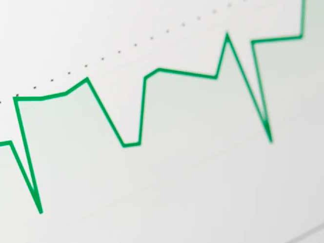 Paper with a green line graph