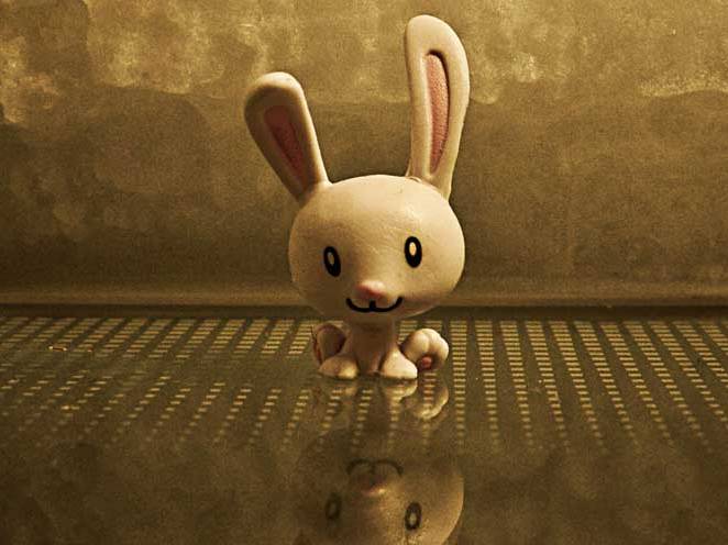 A digital rabbit in a empty room