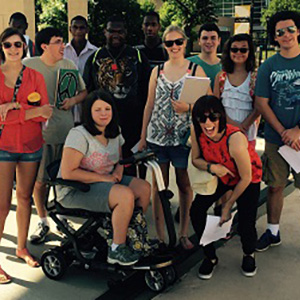 A large group of people smiling for a picture