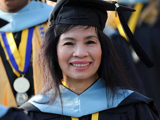 Woman smiling at graduation
