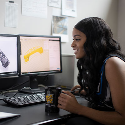 Student looking at her computer