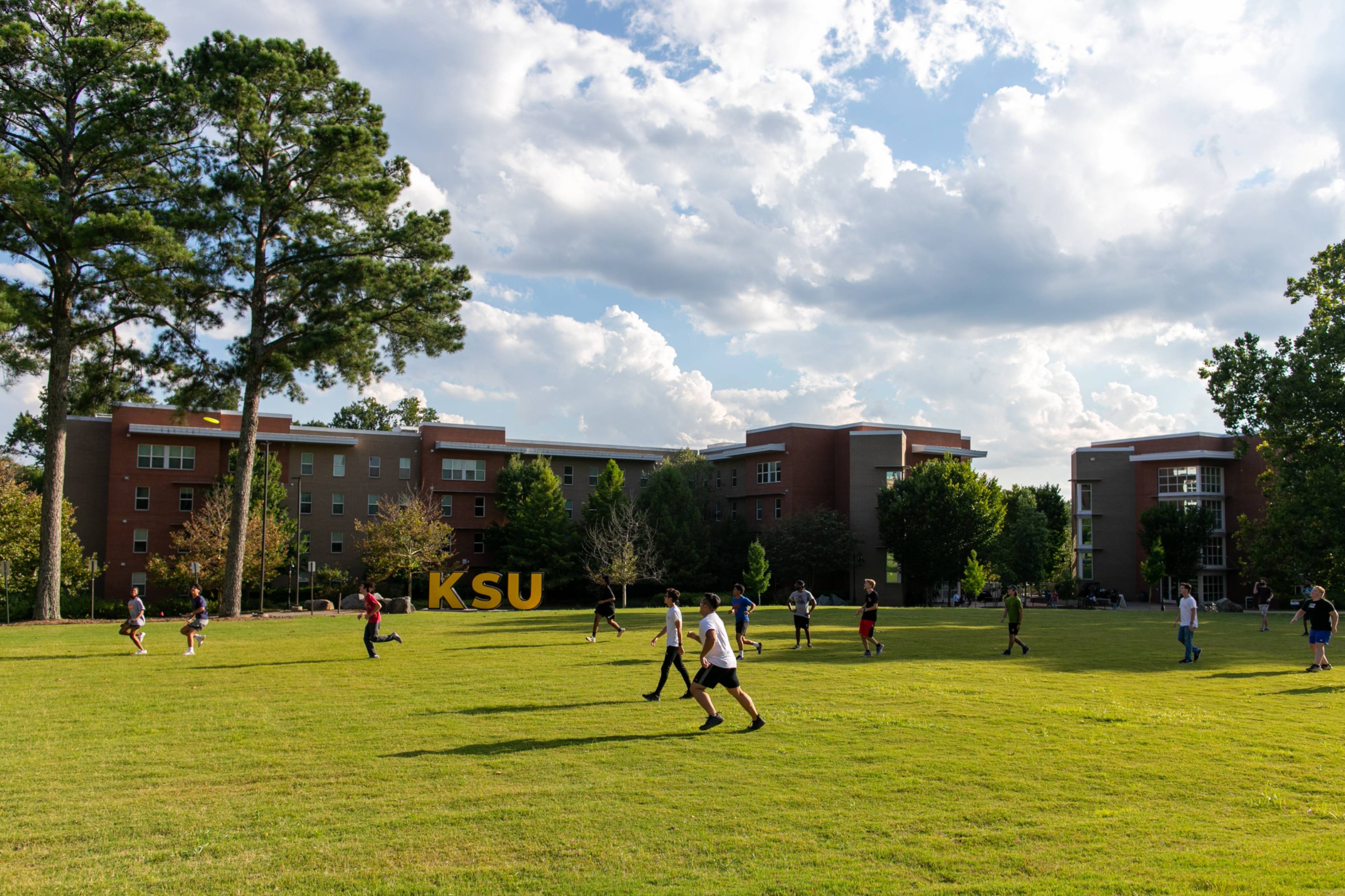 students playing soccer on a field