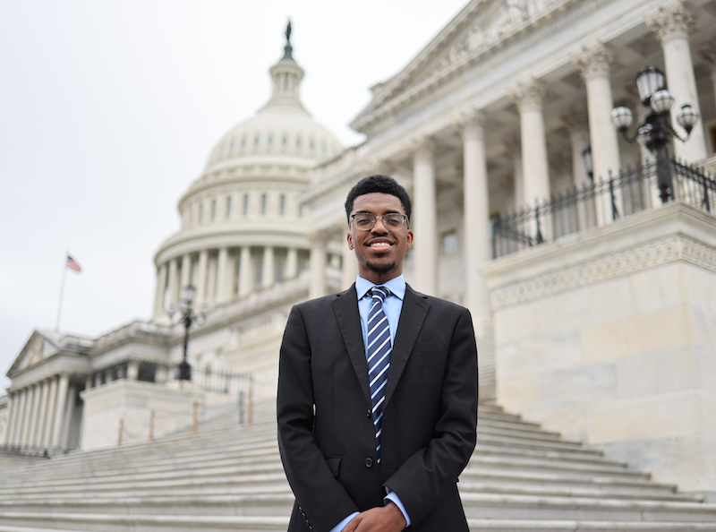 Darrius Knight standing in front of the United States Capitol