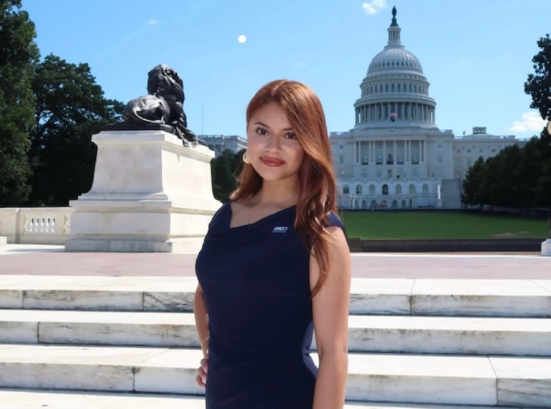 Nahomy Limon standing in front of the U.S. Capitol building