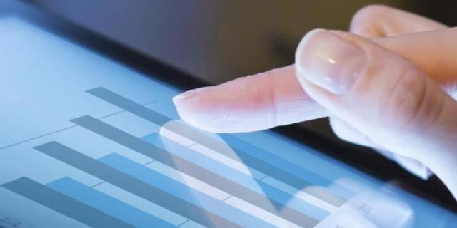 Finger pointing to a bar graph