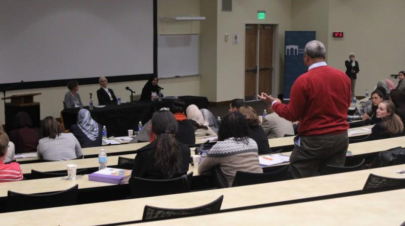  / Conference guest asks a question during the session.